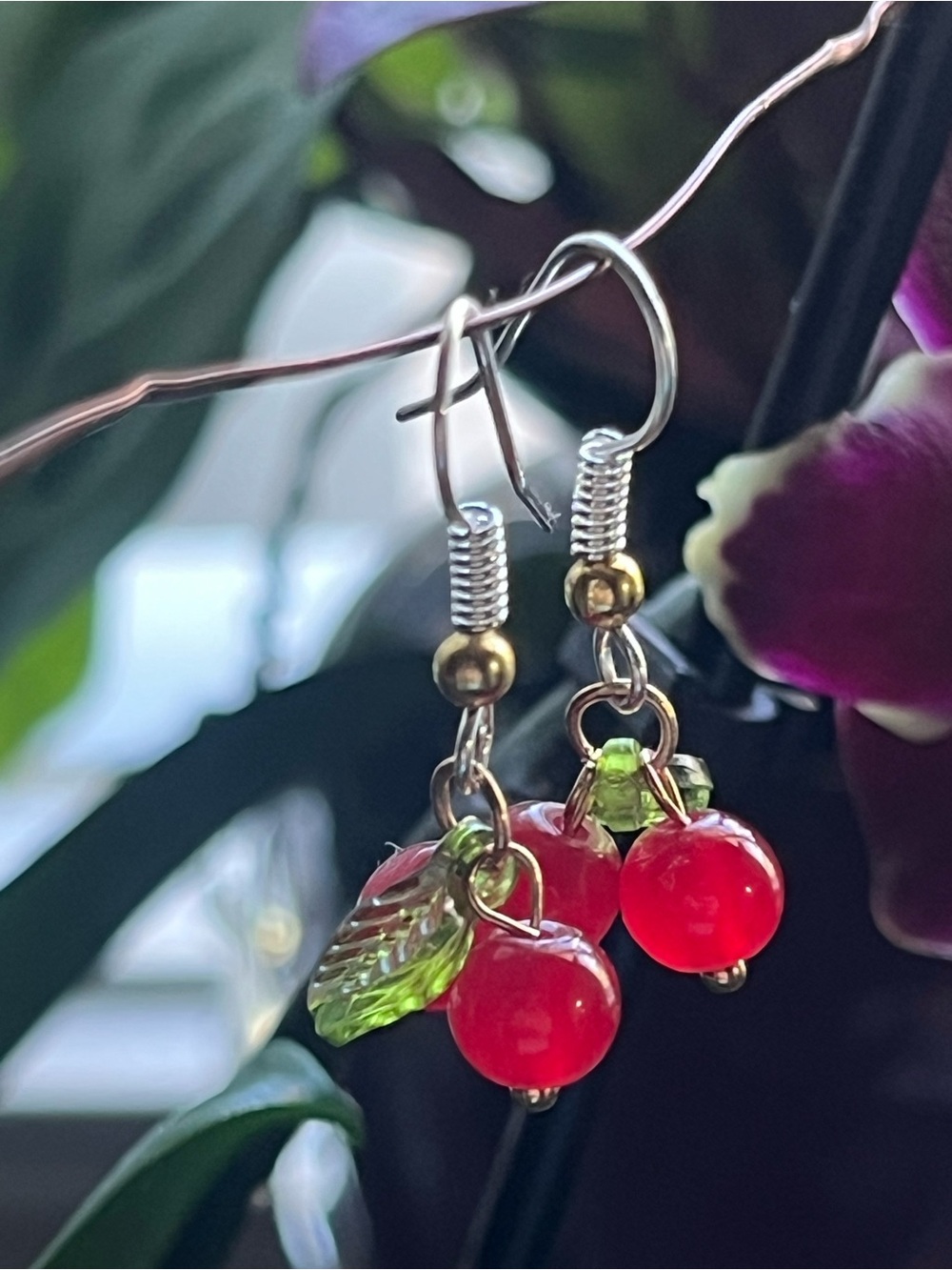 Red Cherry Dangle Earrings with Green Leaf Accent.
